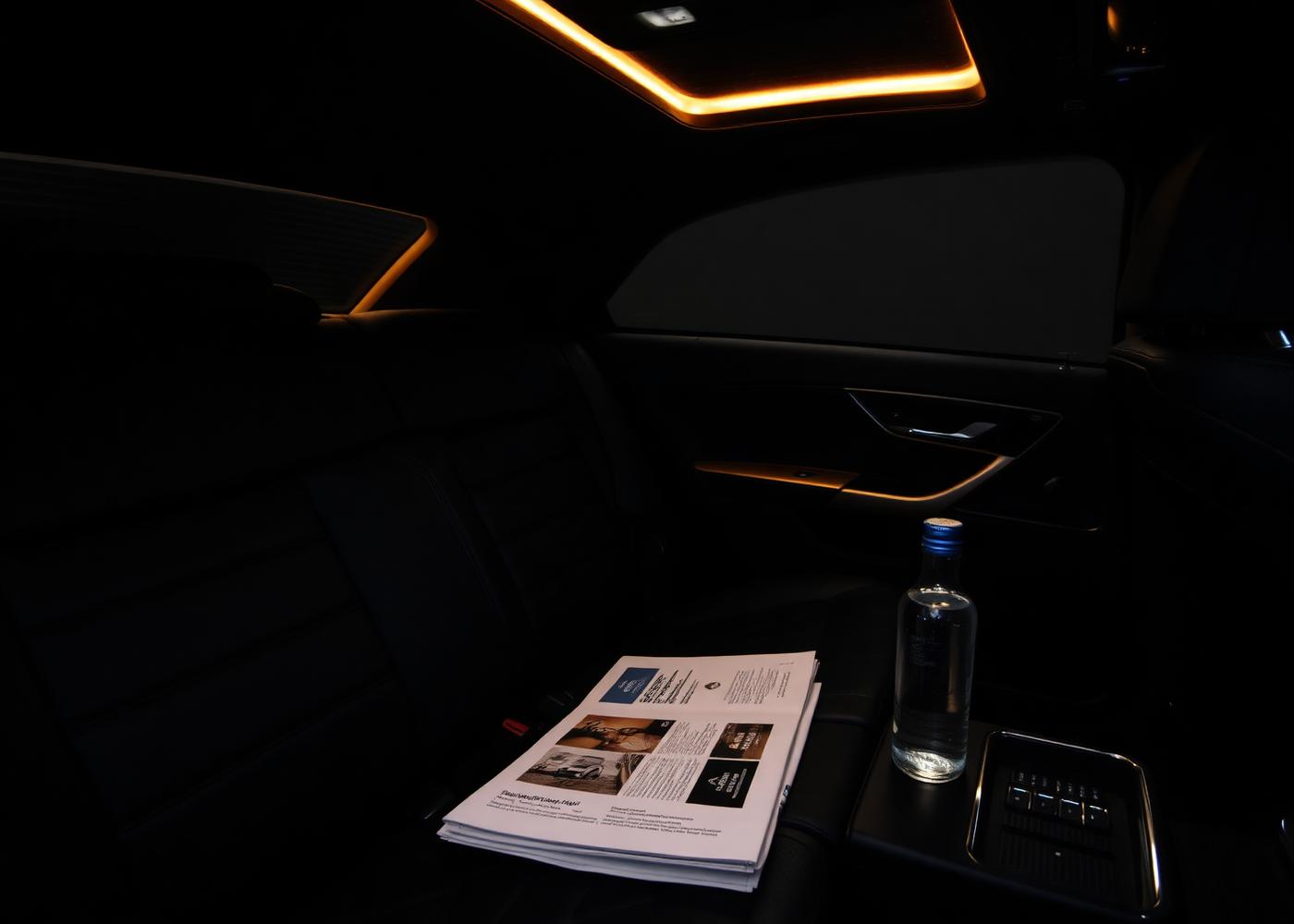 Interior of an executive saloon, softly lit